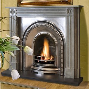 The Cushion Mould Bullseye Mantel in Verde Ardesia