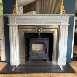 The Regency Bullseye Mantel in Carrara Marble