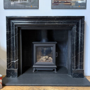 The Bolection Mantel in Nero Marquina Marble