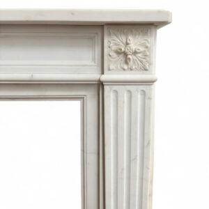 Original French Louis XVI Mantel in Statuary White Marble with Fluted Jambs and Decorative Patrea