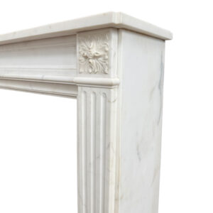 Original French Louis XVI Mantel in Statuary White Marble with Fluted Jambs and Decorative Patrea